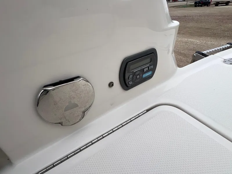 Slide: The Image of 2009 Monterey 254FS boat dashboard with Kenwood Commander audio system. - 33