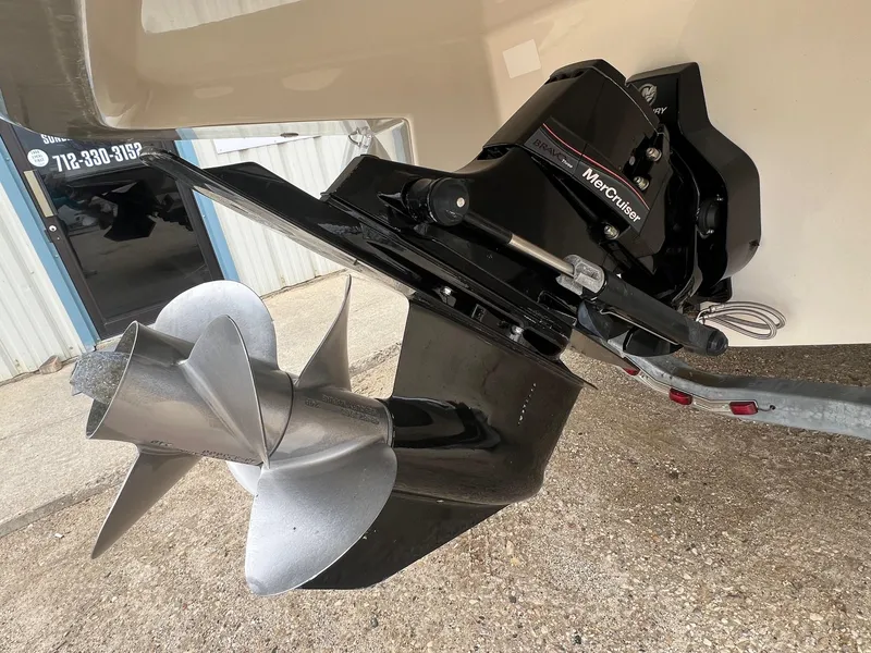 Slide: The Image of Close-up of a 2009 Monterey 254FS boat's MerCruiser Bravo Three outdrive and propeller. - 6