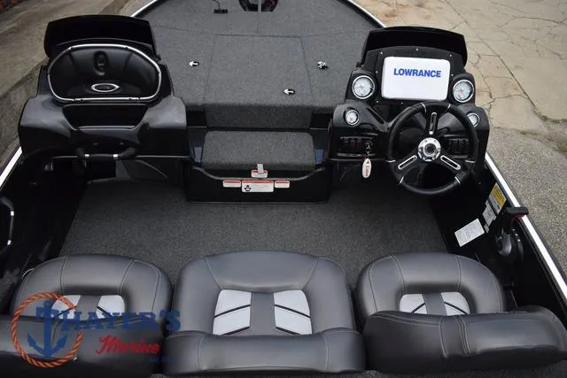 Slide: The Image of 2020 Nitro Z17 boat interior with steering console and seating. - 12