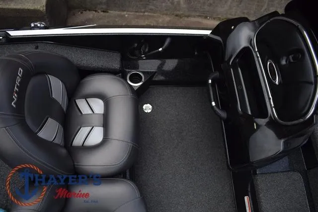 Slide: The Image of Interior of a 2020 Nitro Z17 boat with seating and steering console. - 18
