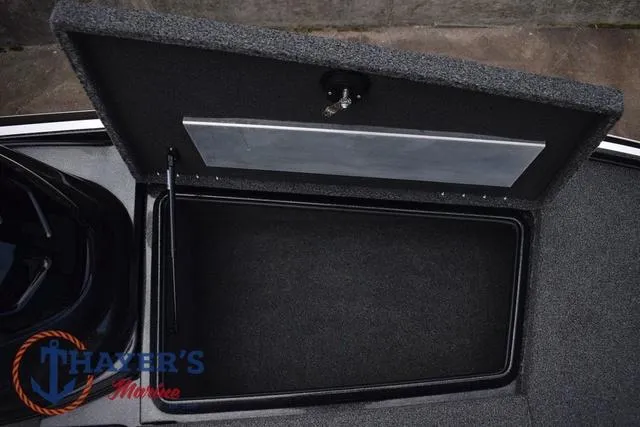 Slide: The Image of Open storage compartment on a 2020 Nitro Z17 boat. - 26