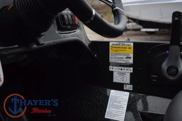 Slide: The Image of Interior view of a 2020 Nitro Z17 boat dashboard with capacity label. - 27