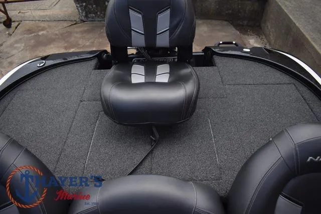 Slide: The Image of 2020 Nitro Z17 boat interior with cushioned seating and carpeted flooring. - 28