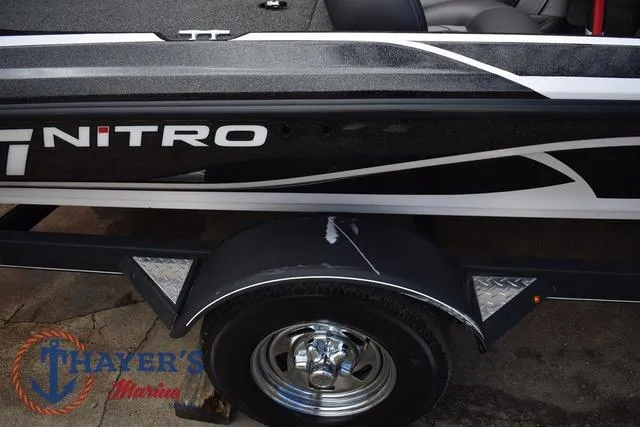 Slide: The Image of 2020 Nitro Z17 boat trailer with Thayer's Marine logo, featuring sleek black and white design. - 35