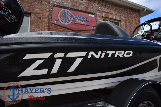 Slide: The Image of 2020 Nitro Z17 boat at Thayer's Marine dealership, featuring sleek design and branding. - 36