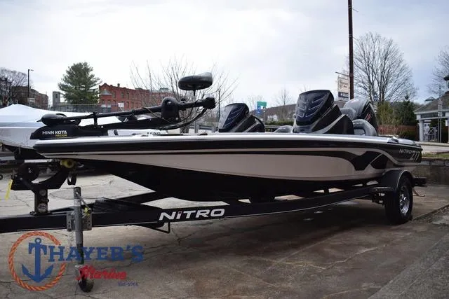 Slide: The Image of 2020 Nitro Z17 fishing boat on trailer, displayed outdoors at Thayer's Marine. - 6