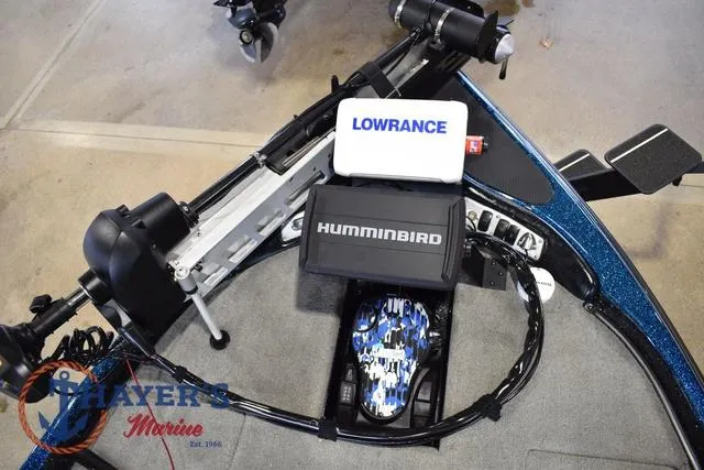 Slide: The Image of 2012 Stratos 294 XLE boat with Lowrance and Humminbird electronics, Thayer's Marine logo visible. - 21
