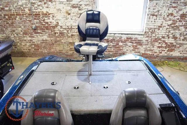 Slide: The Image of 2012 Stratos 294 XLE boat interior with seating and fishing deck. - 22