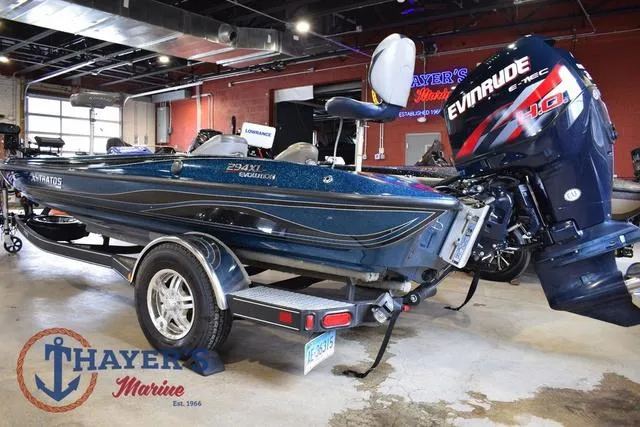 Slide: The Image of 2012 Stratos 294 XLE boat with Evinrude engine at Thayer's Marine showroom. - 4
