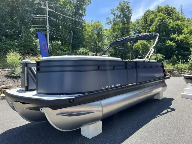 Slide: The Image of 2024 Viaggio Lago V-20C Triple pontoon boat displayed outdoors. - 4