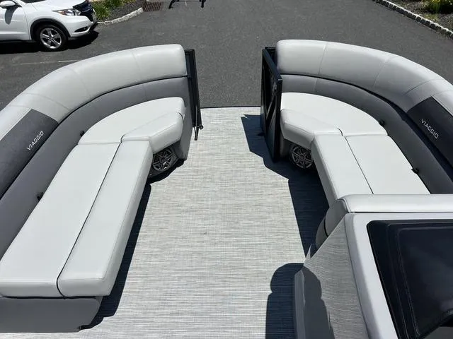 Slide: The Image of 2024 Viaggio Lago V-20C Triple pontoon boat with spacious seating and modern design. - 6