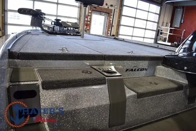 Slide: The Image of 2025 Falcon F20 TE bass boat interior with storage compartments and fishing equipment. - 27