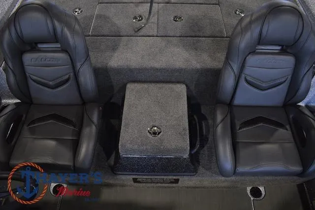 Slide: The Image of 2025 Falcon Bass Boats F20 TE interior with two black seats and center console. - 30