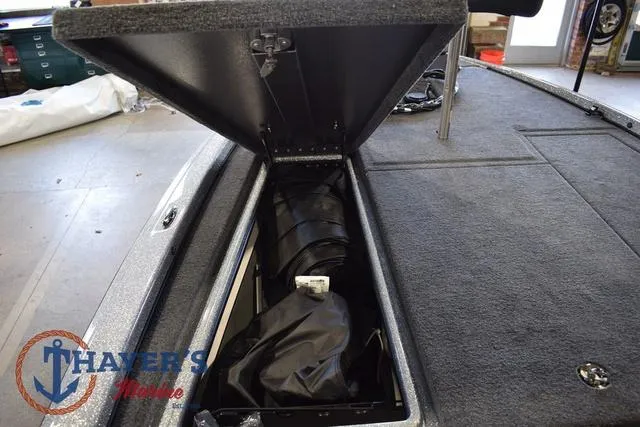 Slide: The Image of Open storage compartment in 2025 Falcon Bass Boats F20 TE, showcasing interior space. - 33