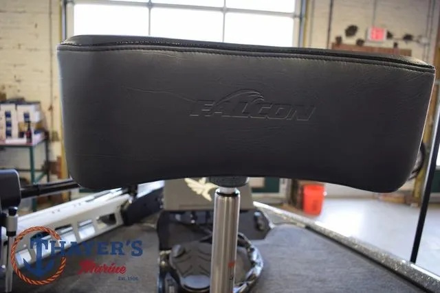 Slide: The Image of 2025 Falcon F20 TE boat seat in showroom, featuring embossed logo and marine equipment. - 35