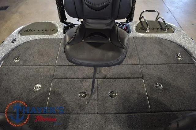 Slide: The Image of 2025 Falcon Bass Boats F20 TE interior with cushioned seating and storage compartments. - 38