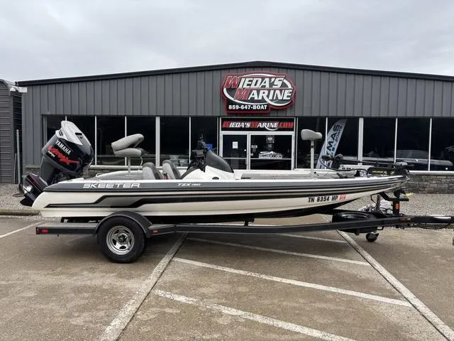 Slide: The Image of 2013 Skeeter TZX190 boat on trailer outside Wieda's Marine dealership. - 1