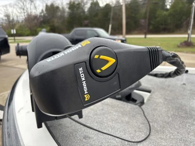 Slide: The Image of Minn Kota trolling motor on 2013 Skeeter TZX190 boat, parked outdoors. - 7