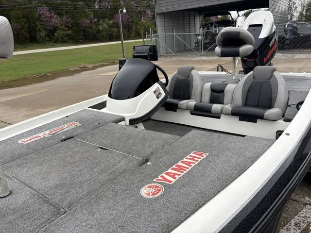 Slide: The Image of 2013 Skeeter TZX190 boat with Yamaha branding, featuring dual seats and a sleek design. - 8