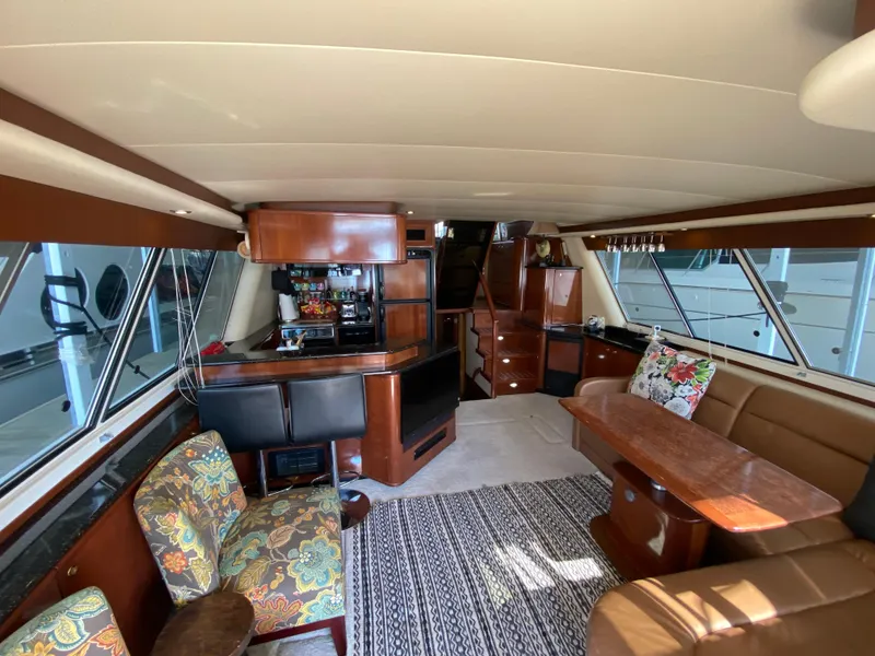 Slide: The Image of Luxurious interior of a 2008 Meridian 490 Pilot House yacht with elegant furnishings. - 18