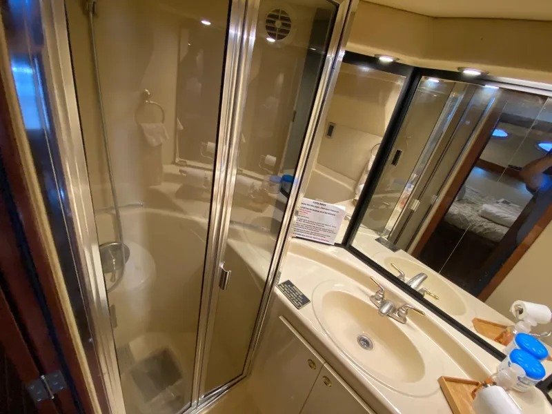 Slide: The Image of Bathroom interior of 2008 Meridian 490 Pilot House yacht, featuring sink and shower. - 34