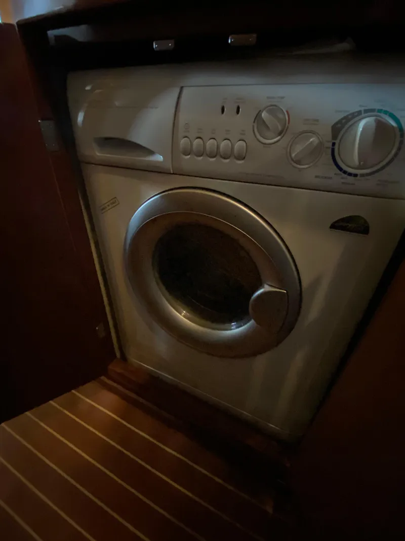 Slide: The Image of Washing machine inside 2008 Meridian 490 Pilot House yacht interior. - 35