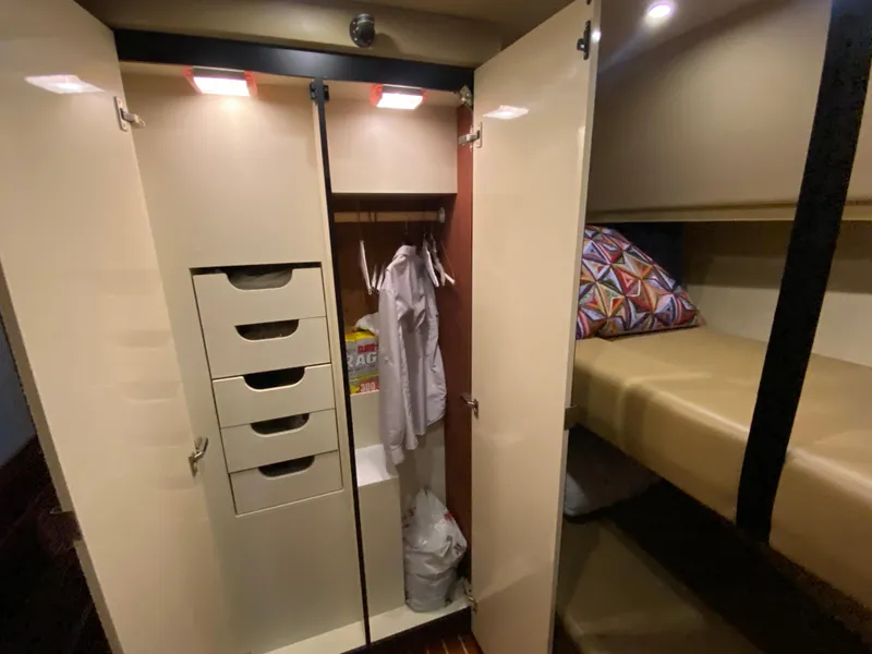 Slide: The Image of Interior of 2008 Meridian 490 Pilot House with open closet and bunk bed. - 39