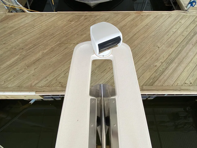 Slide: The Image of Bow view of a 2008 Meridian 490 Pilot House yacht at a wooden dock. - 49