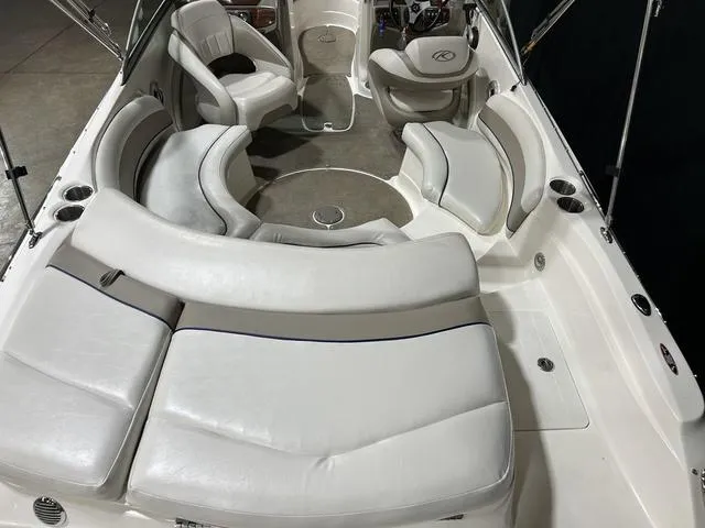 Slide: The Image of 2007 Kayot V220i boat interior with white leather seating and modern design. - 11