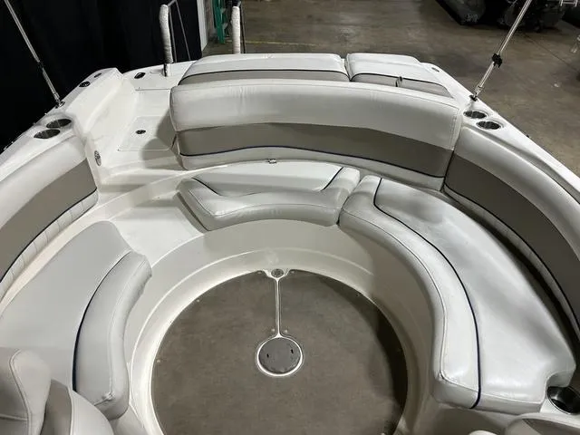 Slide: The Image of 2007 Kayot V220i boat interior with circular seating and white upholstery. - 33