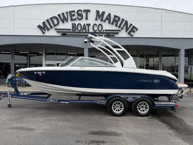 Slide: The Image of 2012 Cobalt 220S boat on trailer at Midwest Marine Boat Co. dealership. - 1
