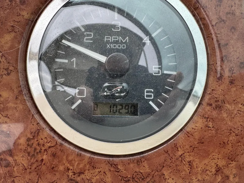 Slide: The Image of Tachometer of 2000 Sea Ray 340 Sundancer showing RPM and digital display. - 20