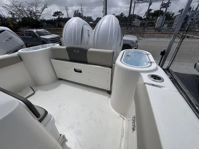 Slide: The Image of 2025 Key West 260 CC boat interior with dual Yamaha engines, spacious seating, and modern design. - 7
