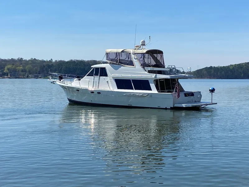 Slide: The Image of 2008 Meridian 490 Pilothouse yacht on calm lake waters. - 0
