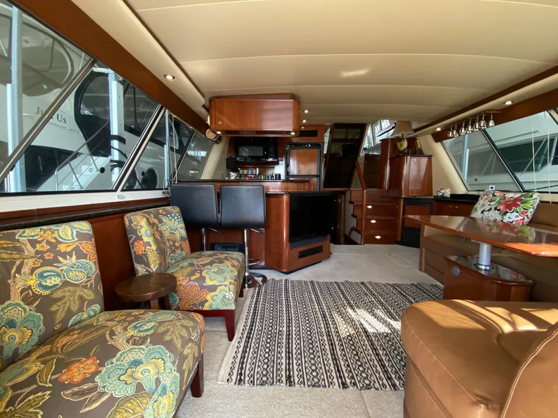 Slide: The Image of Luxurious interior of 2008 Meridian 490 Pilothouse with elegant seating and wood finishes. - 18