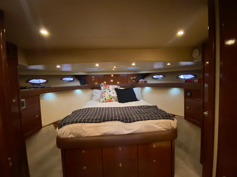 Slide: The Image of Luxurious bedroom interior of 2008 Meridian 490 Pilothouse yacht with cozy bedding. - 37