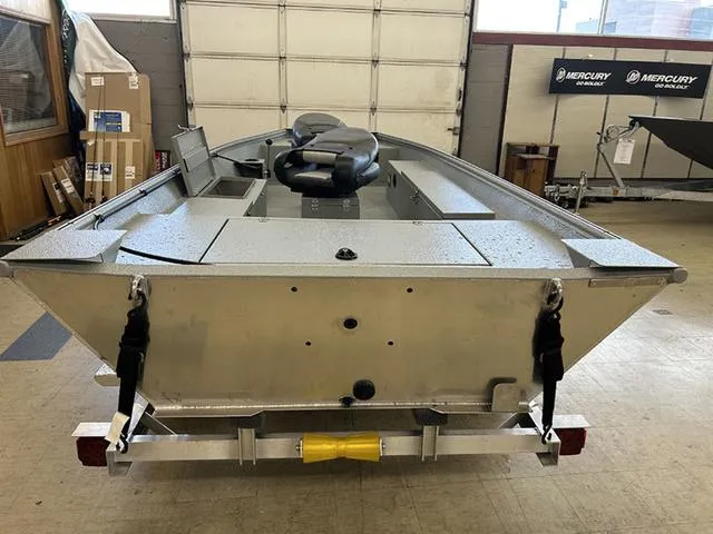 Slide: The Image of 2025 XTREME BOATS Brute 1648 SS in showroom, rear view on trailer. - 5