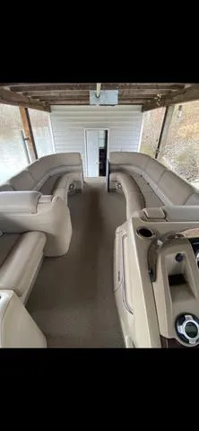 Slide: The Image of 2011 Bennington 2550 RCL pontoon boat interior with spacious seating and modern design. - 8