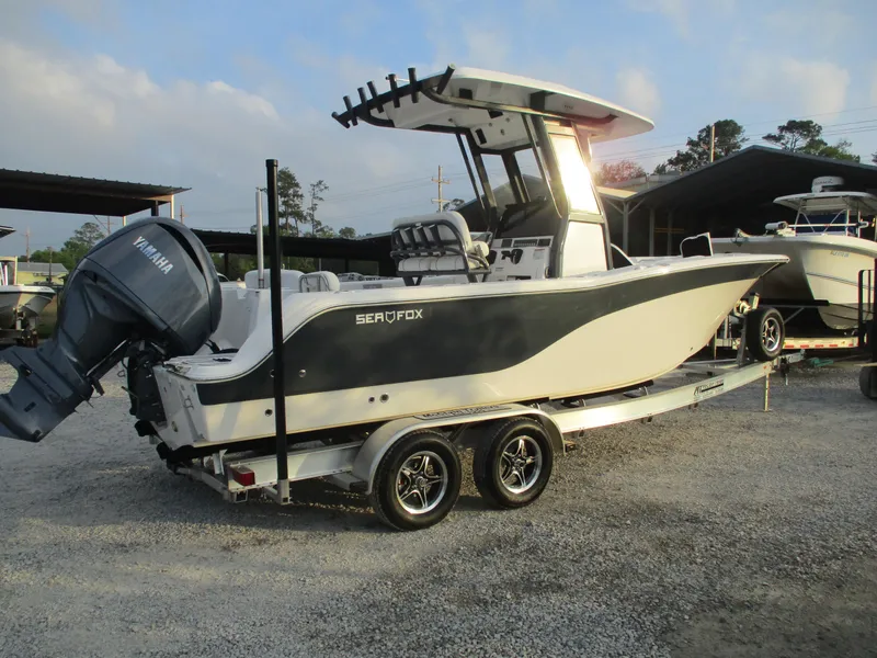 Slide: The Image of 2025 Sea Fox 248 Commander boat on trailer, featuring Yamaha outboard motor. - 2