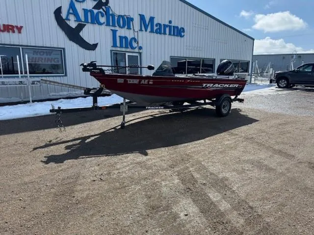 Slide: The Image of 2019 Tracker Super Guide V-16 SC boat on trailer at Anchor Marine Inc. dealership. - 23