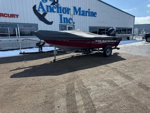 Slide: The Image of 2019 Tracker Super Guide V-16 SC boat on trailer outside Anchor Marine Inc. - 25