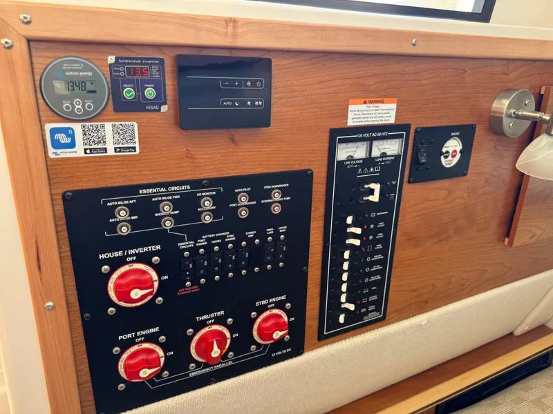 Slide: The Image of Control panel of 2025 Cutwater C-288 Coupe boat, featuring essential circuits and switches. - 29