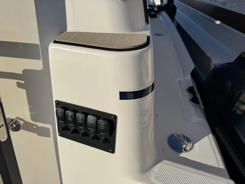 Slide: The Image of 2025 Cutwater C-288 Coupe boat control panel and deck detail. - 40