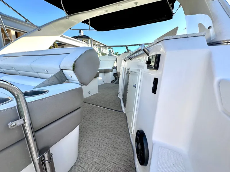 Slide: The Image of 2017 Regal 32 Express boat interior with sleek seating and modern design. - 18