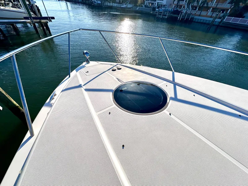 Slide: The Image of 2017 Regal 32 Express boat deck with water view. - 6