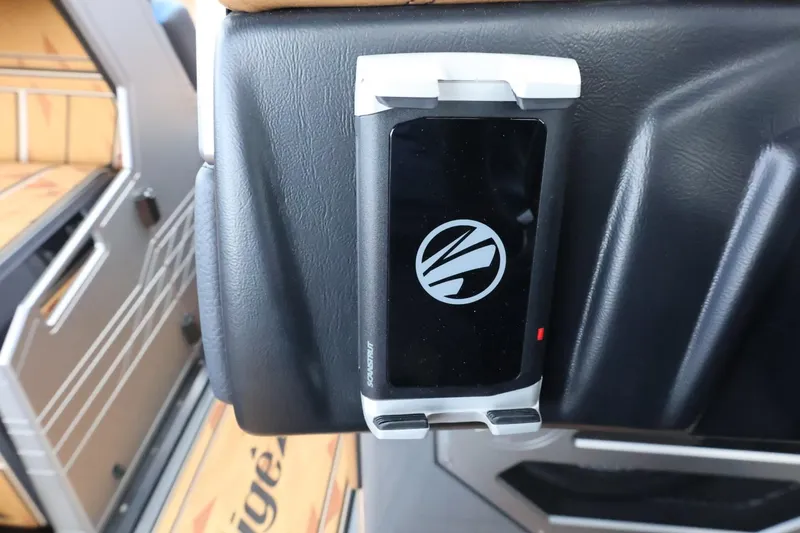 Slide: The Image of Phone holder in 2025 Tigé Ultré 25ZX boat interior. - 39