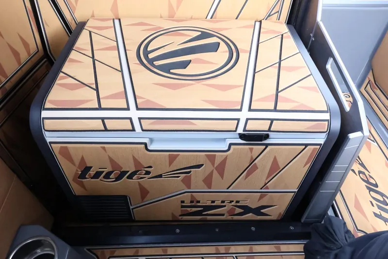 Slide: The Image of 2025 Tigé Ultré 25ZX boat interior with stylish geometric design. - 43