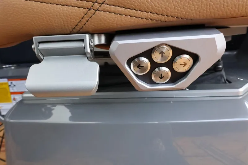 Slide: The Image of Control panel on Tigé Ultré 25ZX boat seat, featuring directional buttons, 2025 model. - 48
