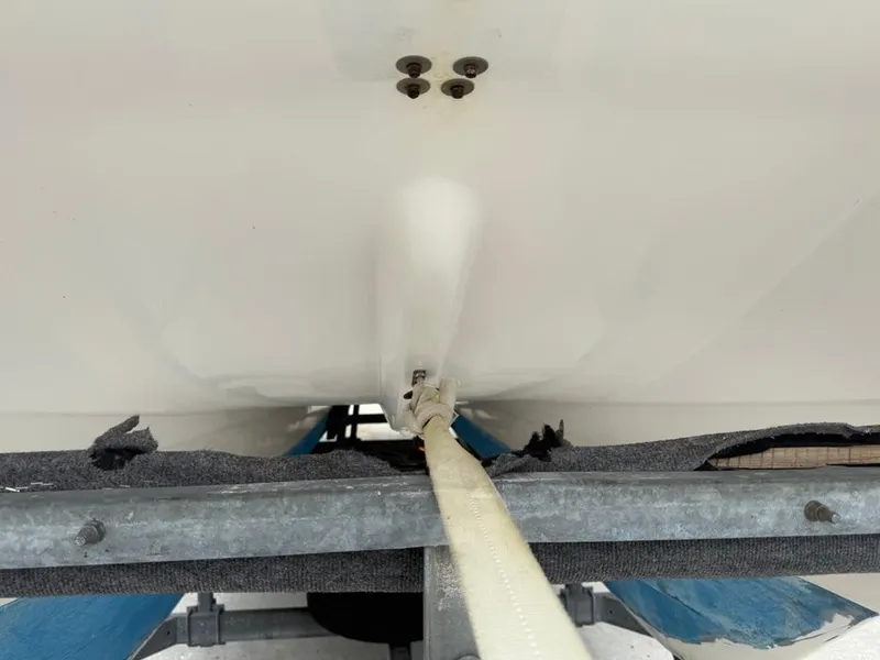 Slide: The Image of 2005 Twin Vee 26 Center Console boat hull on trailer. - 16