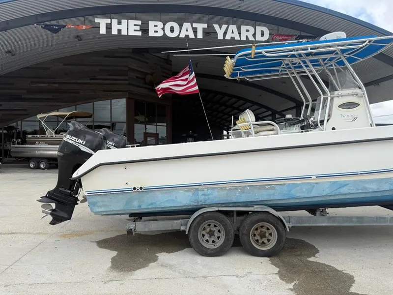 Slide: The Image of 2005 Twin Vee 26 Center Console boat on trailer at The Boat Yard. - 2